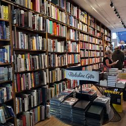 Books & Books - Look at this beautiful wall of books! That's now even half of it. There are two floors!