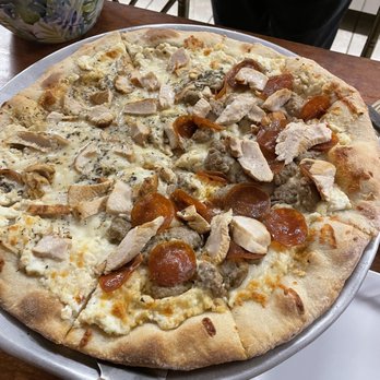 Mediterranean Experience - Best white pizza not made with No Alfredo sauce, so fresh and good - Mediterranean Near Me - Daytona Beach, Florida