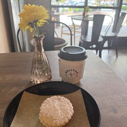 Latte and a Alfajor cookie Latte and a Alfajor cookie