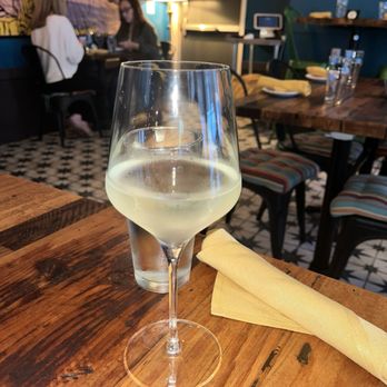 Bésame - A perfect glass of white wine - Tapas/Small Plates Near Me - New Orleans, Louisiana Bésame - A perfect glass of white wine - Tapas/Small Plates Near Me - New Orleans, Louisiana