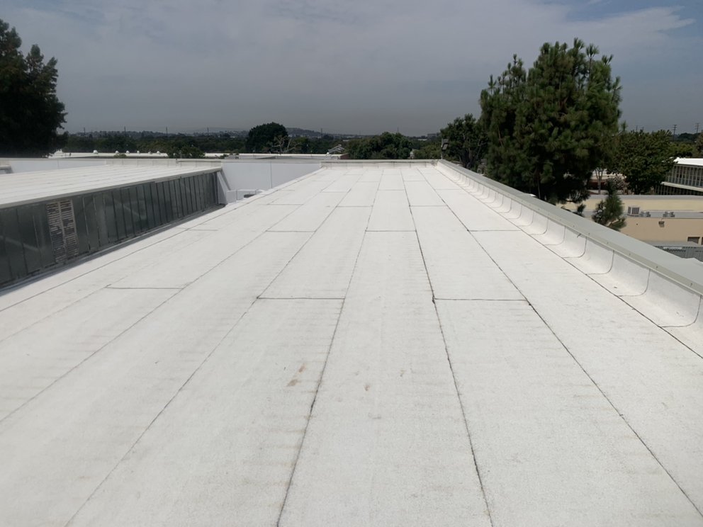 Slide of Maven Roofing Company