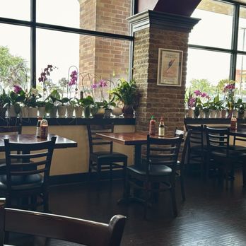 Pho Old Town - Lovely orchids along the window, it so serene, such lovely atmosphere - Vietnamese Near Me - Katy, Texas