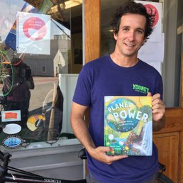 Exterior outside entrance of Young's Bicycle Shop - Jasper Young has loved bikes since he worked at the shop as a kid. "Biking is a renewable resource," he said when I handed him my book. - Nantucket, Massachusetts Exterior outside entrance of Young's Bicycle Shop - Jasper Young has loved bikes since he worked at the shop as a kid. "Biking is a renewable resource," he said when I handed him my book. - Nantucket, Massachusetts