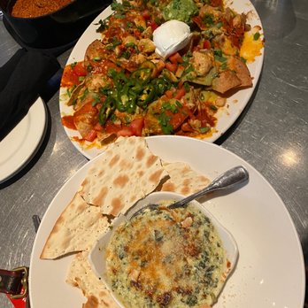 Yard House - Chicken Nachos and Four Cheese Spinach Dip - Bars Near Me - San Antonio, Texas Yard House - Chicken Nachos and Four Cheese Spinach Dip - Bars Near Me - San Antonio, Texas