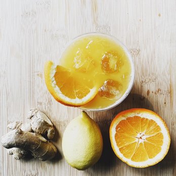 PoPsy - a bowl of orange juice and sliced lemons - Wraps Near Me - Tupelo, Mississippi PoPsy - a bowl of orange juice and sliced lemons - Wraps Near Me - Tupelo, Mississippi