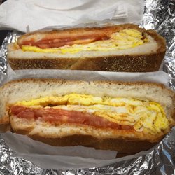 Best Deli & Grill - Egg and tomato on a roll with hot sauce