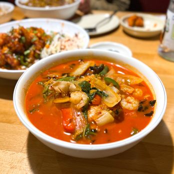 Sang-Hi - a bowl of soup and plates of food - Asian Fusion Near Me - North Wales, Pennsylvania Sang-Hi - a bowl of soup and plates of food - Asian Fusion Near Me - North Wales, Pennsylvania