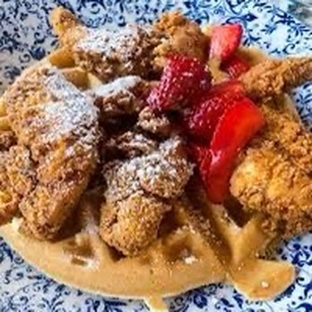 SoLou - Chicken and waffles with cane butter, powdered sugar, strawberries and maple syrup! - New American Near Me - Baton Rouge, Louisiana SoLou - Chicken and waffles with cane butter, powdered sugar, strawberries and maple syrup! - New American Near Me - Baton Rouge, Louisiana