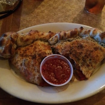 Red Devil Restaurant & Bar - Red devil combo calzone - Italian Near Me - Pinetop, Arizona Red Devil Restaurant & Bar - Red devil combo calzone - Italian Near Me - Pinetop, Arizona