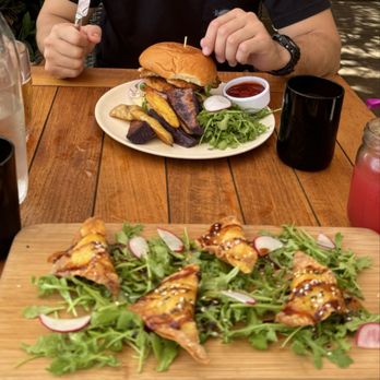 Malibu Farm - Shrimp/lobster fried wonton salad (special of the day) with beef burger in background - Breakfast & Brunch Near Me - Lanai City, Hawaii