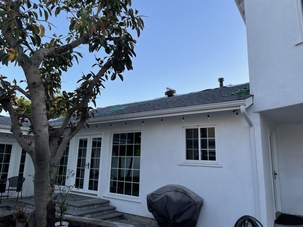 Slide of All American Construction And Roofing