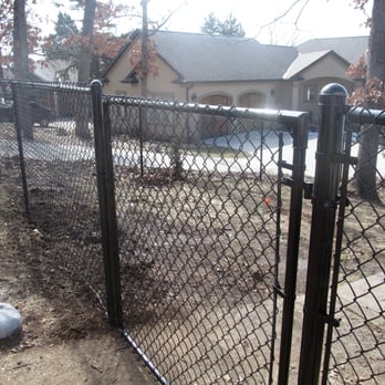 Ozark Tree and Landscape - Black chainlink fence - Tree Services Near Me - Barnett, Missouri