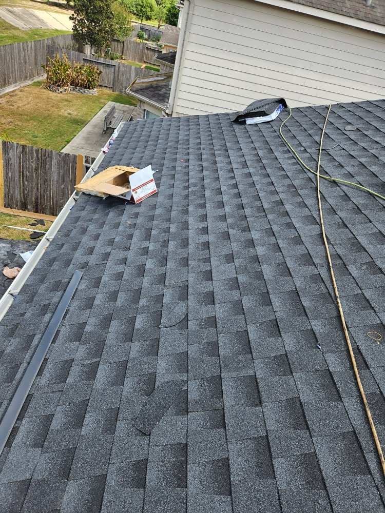 Slide of Daniel's Roofing and Painting