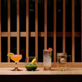Shanghai Bar - three cocktails on a wooden table - Whiskey Bars Near Me - Honolulu, Hawaii Shanghai Bar - three cocktails on a wooden table - Whiskey Bars Near Me - Honolulu, Hawaii
