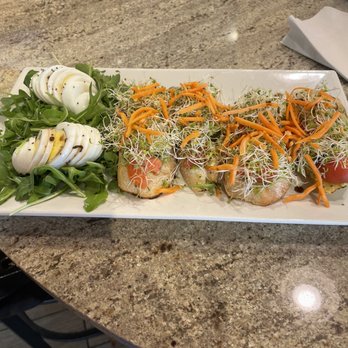 The Egg Bistro - (Loaded) Avocado toast with side of boiled eggs and arugula - Breakfast & Brunch Near Me - Chesapeake, Virginia