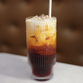 Bangrak - Thai Restaurant - Thai Iced Tea -- classic Thai milk tea at Bangrak Thai Cuisine on the Upper East Side. - Thai Near Me - New York, New York Bangrak - Thai Restaurant - Thai Iced Tea -- classic Thai milk tea at Bangrak Thai Cuisine on the Upper East Side. - Thai Near Me - New York, New York