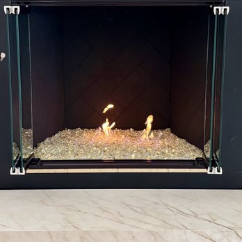 Encino Fireplace Shop - Updated fireplace after painting and adding a new burner and glass - Fireplace Services Near Me - Encino, California Encino Fireplace Shop - Updated fireplace after painting and adding a new burner and glass - Fireplace Services Near Me - Encino, California