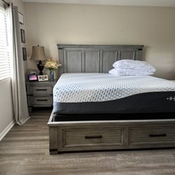 Russelyn storage bed, side table, and Ashley memory foam mattress