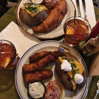 Tip Top Tavern - Fish fry (walleye in back and cod in front) with loaded baked potato - New American Near Me - Madison, Wisconsin Tip Top Tavern - Fish fry (walleye in back and cod in front) with loaded baked potato - New American Near Me - Madison, Wisconsin
