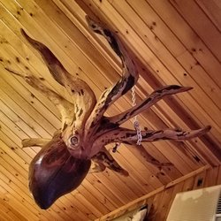 Boone & Crockett's Riverside Cafe - A local wood carver's "Octopus" graces the wooden ceiling of Boone and Crockett's in Kent, New York.
