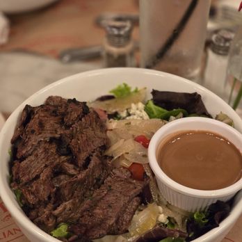 La Bottega - Bistecca E Zola Salad Roasted Angus steak, mixed greens, cherry tomatoes, Gaeta olives, sautéed onions, gorgonzola, balsamic dressing. - Italian Near Me - West Hempstead, New York La Bottega - Bistecca E Zola Salad Roasted Angus steak, mixed greens, cherry tomatoes, Gaeta olives, sautéed onions, gorgonzola, balsamic dressing. - Italian Near Me - West Hempstead, New York