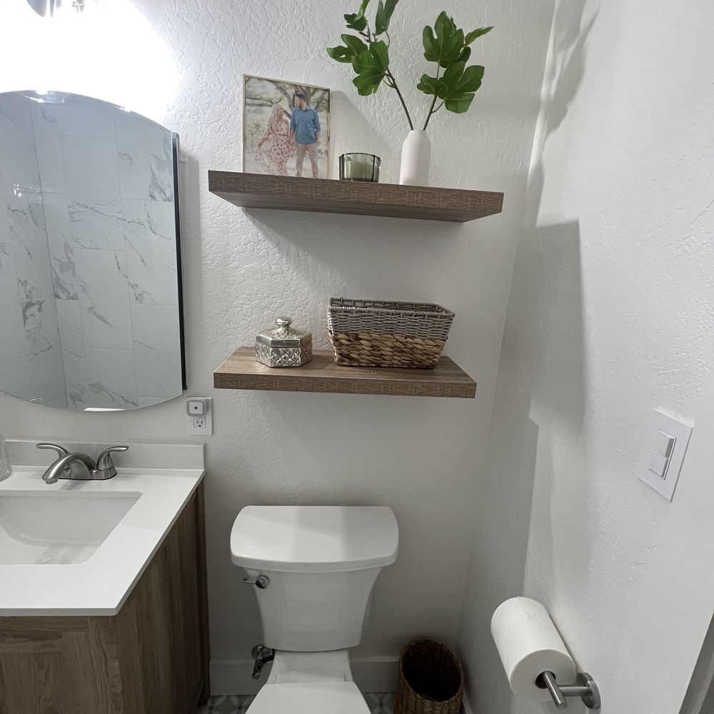 JR&G Construction - a white toilet in a bathroom - General Contractors Near Me JR&G Construction - a white toilet in a bathroom - General Contractors Near Me