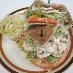 The Golden Parachute Restaurant and Catering Co - Veggie Pita with Hummus, Havarti Cheese, Cucumber, Tomato, Mushrooms and Sprouts
