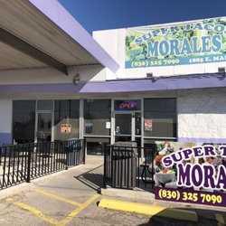 Morales Tacos - Outside front with covered seating.