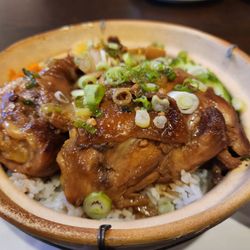 Pho Bulous - Clay Pot Chicken - dark meat chicken, white rice,  cucumbers,  carrots, and lettuce.