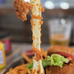 Vikings Bar and Grill - Jalapeno cheese stick, part of the Viking burger. Cheese pull game on point.