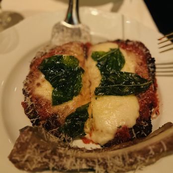 Carbone - Veal Parmesan with bone. It was absolutely amazing. - Italian Near Me - Las Vegas, Nevada Carbone - Veal Parmesan with bone. It was absolutely amazing. - Italian Near Me - Las Vegas, Nevada
