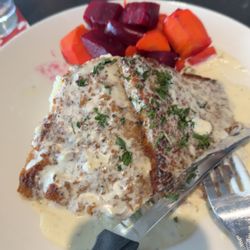Partners Pub & Grill - Schnitzel, mashed potatoes, dill white gravy, roasted beats and carrots.