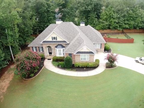 Slide of Whitaker Roofing Company