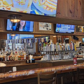 Miller's Ale House - Very full bar with lots of taps - Sports Bars Near Me - Jacksonville, Florida