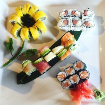 Wasabi - Sunflower, philly, salmon, and rainbow rolls. All delicious and great presentation! - Japanese Near Me - Buffalo, New York