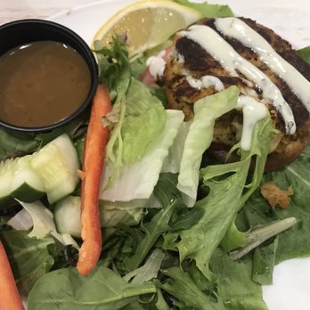 The Sand Dollar Beach Kitchen - Crab cake with side salad. - New American Near Me - Chesterfield, Virginia The Sand Dollar Beach Kitchen - Crab cake with side salad. - New American Near Me - Chesterfield, Virginia
