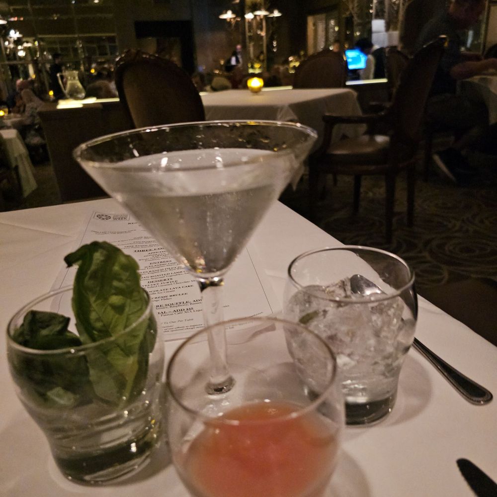 Wally's Desert Turtle - Grey Goose martini with blue cheese olives, fresh grapefruit juice, and basil. - Steakhouses Near Me - Rancho Mirage, California Wally's Desert Turtle - Grey Goose martini with blue cheese olives, fresh grapefruit juice, and basil. - Steakhouses Near Me - Rancho Mirage, California
