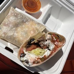 Dick's Restaurant - Taco wrap with a side of Frank's