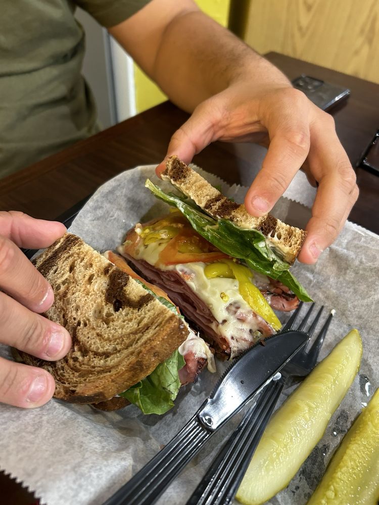 The Downtown Eatery And Deli Logo