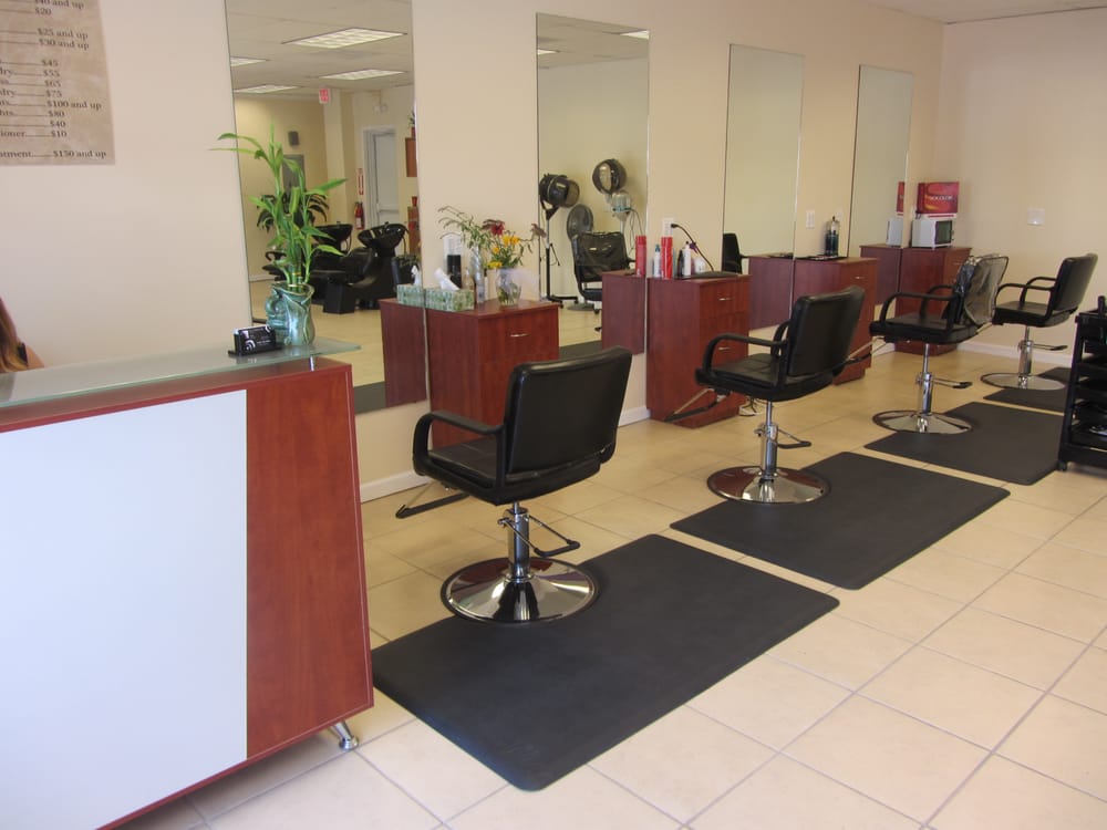 Cut and Curl Hair Salon Logo