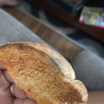 Jason's Deli - a hand holding a piece of bread - Delis Near Me - North Little Rock, Arkansas