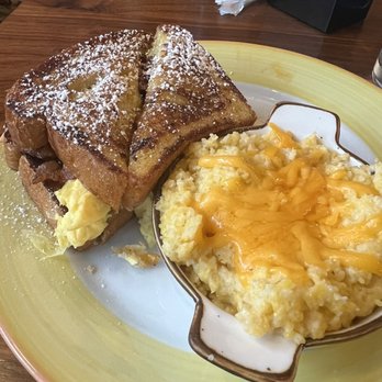 Honeycomb Cafe - French Toast Sammy with grits - New American Near Me - Belmont, North Carolina