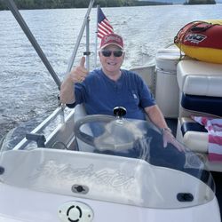 Mountain's Market - Grover from Dover enjoying the gifts of Beautiful Sebec Lake.