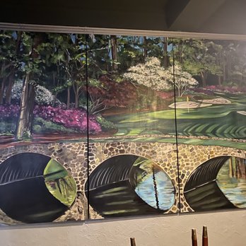 The Sandtrap Grill & Tap - a painting of a golf course - Wine Bars Near Me - Riverside, Illinois