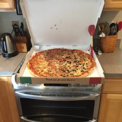Half Italian sausage/ mushroom, half black olive/ green pepper.