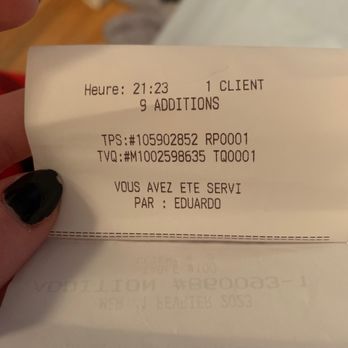 Solymar - a person's hand holding a receipt - Peruvian Near Me - Montreal, Quebec Solymar - a person's hand holding a receipt - Peruvian Near Me - Montreal, Quebec