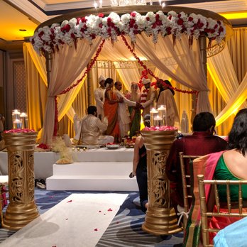 The Henry, Autograph Collection - Indian wedding taking place inside one of the ballrooms. - Hotels Near Me - Dearborn, Michigan The Henry, Autograph Collection - Indian wedding taking place inside one of the ballrooms. - Hotels Near Me - Dearborn, Michigan