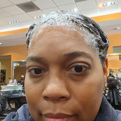 Empire Beauty School - My relaxer Wendy worked in, she was professional and my head wasn't burning.