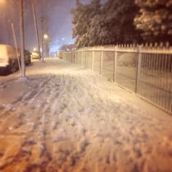 Highland Plaza Condominiums - Front sidewalk after the severe snow. 2014