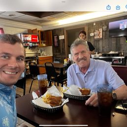 Two handsome guys with their meals. Two handsome guys with their meals.